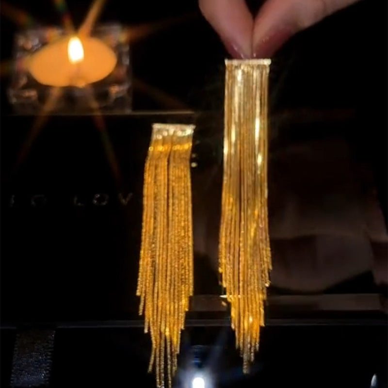 أقراط "الشلال الذهبي" ✨ سحر الأنوثة الطاغية